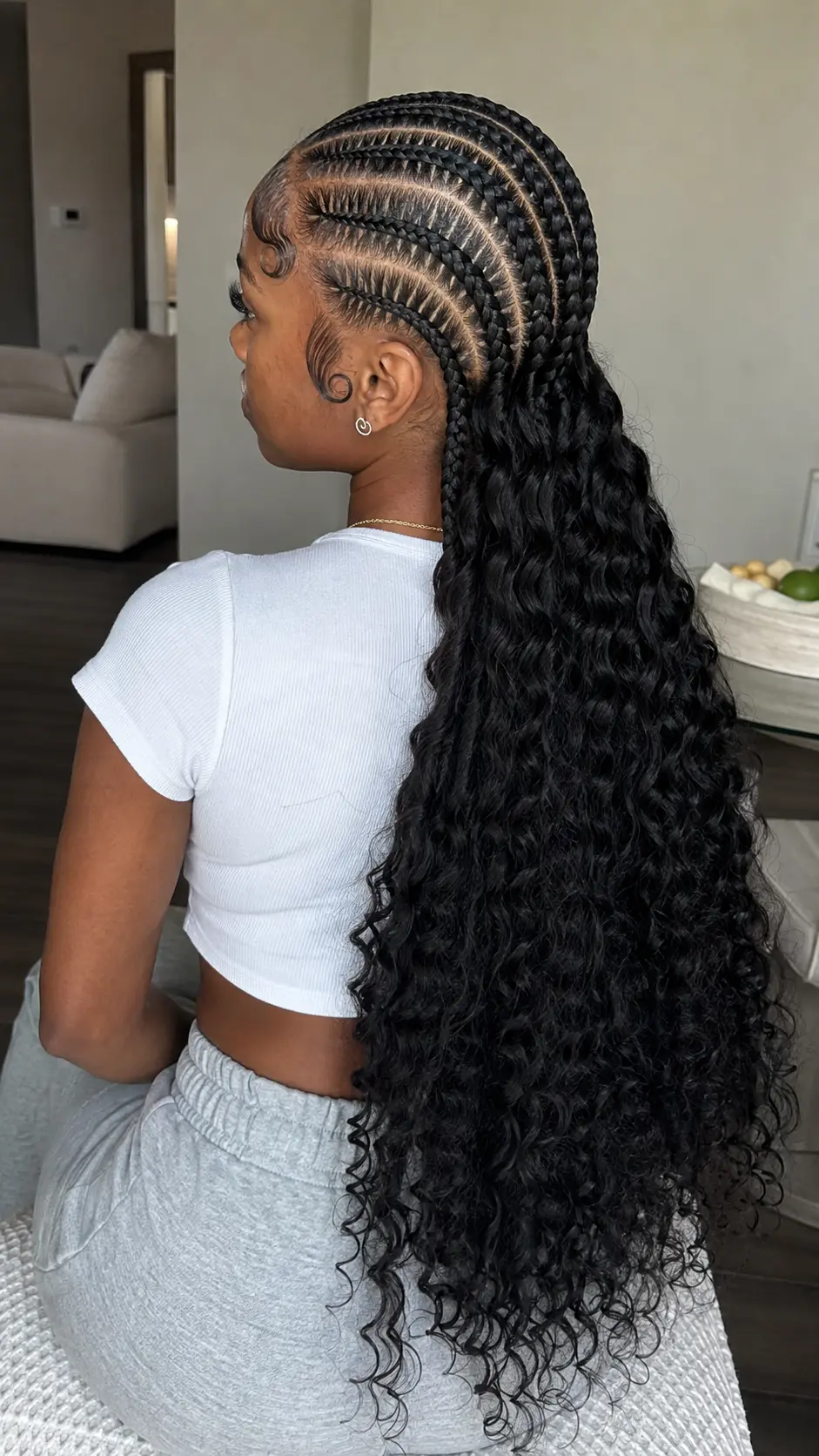 Classic Jada Wayda braids with long black curls
