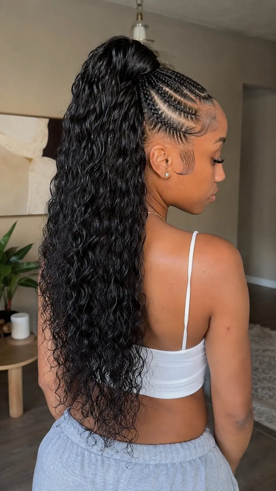 Half-up Jada Wayda hairstyle with long curls
