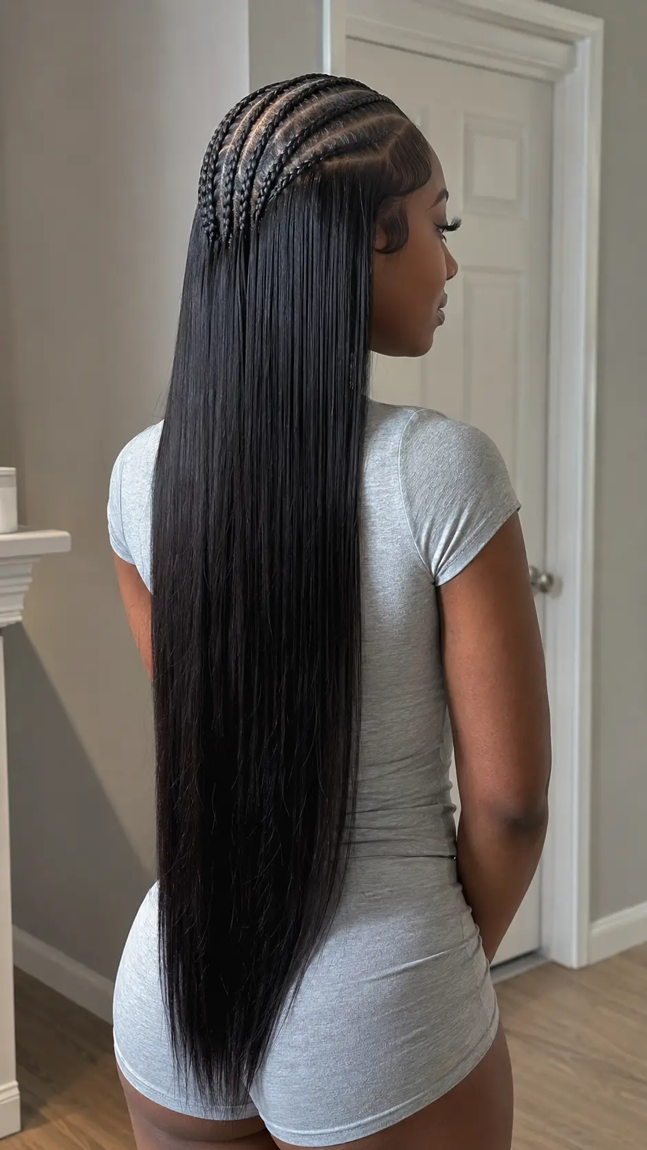 Sleek straight Jada Wayda hairstyle with front braids