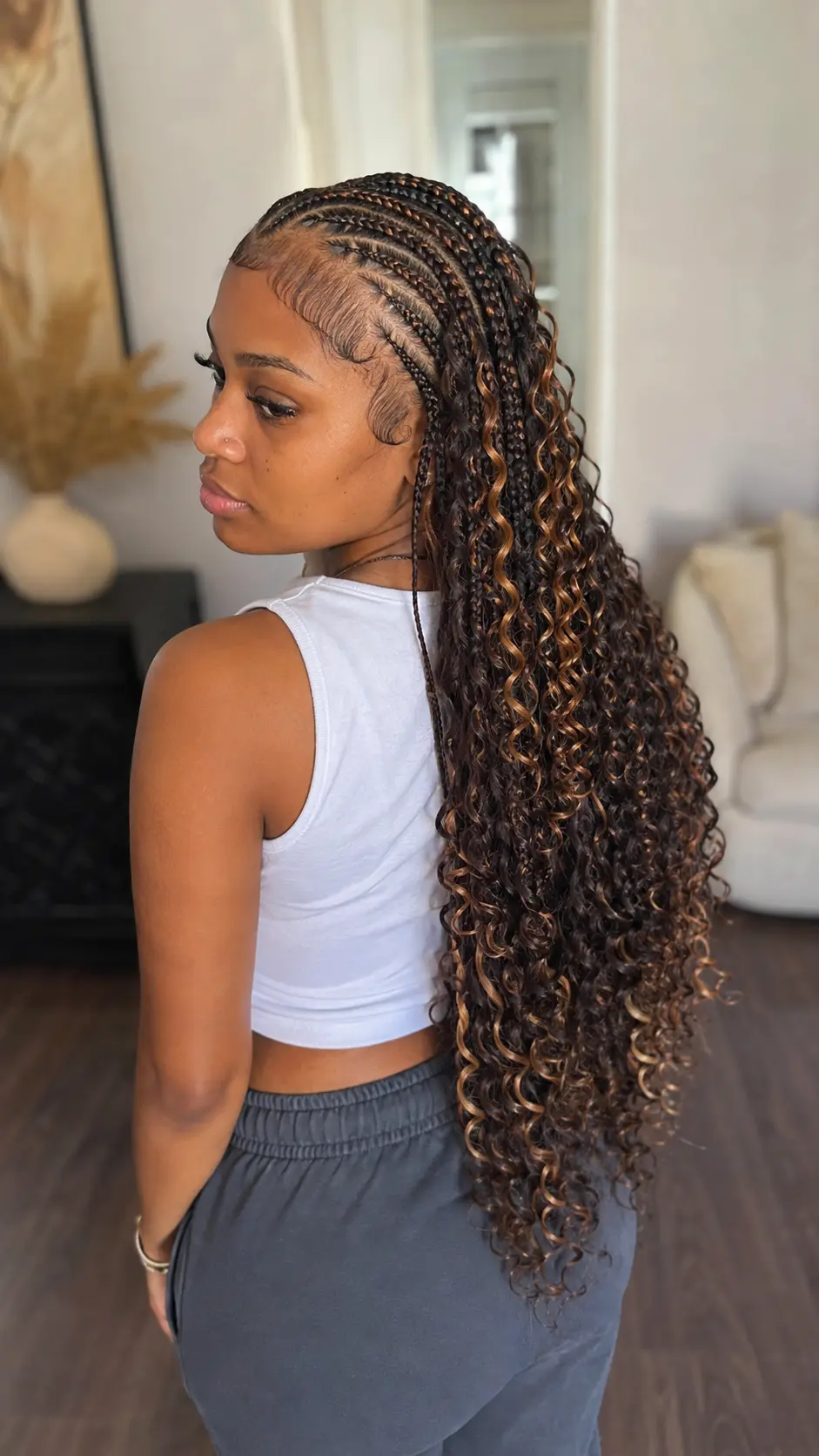 Caramel-highlight Jada Wayda curls and braids