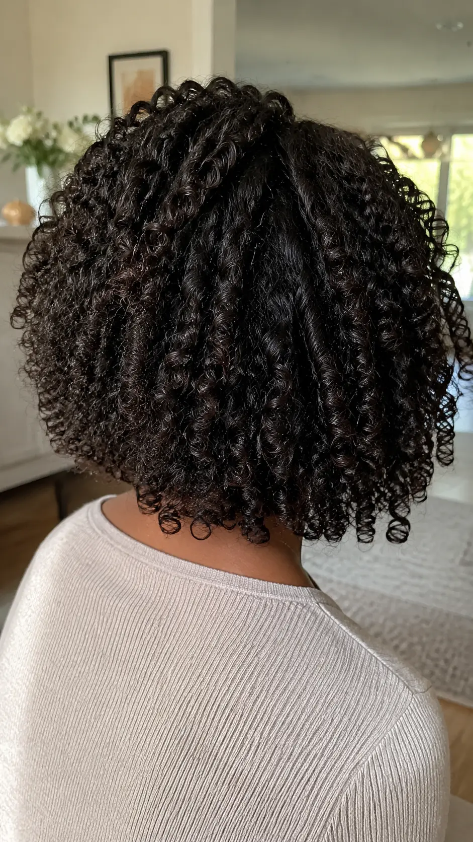 Natural curly shoulder length haircut for Black women