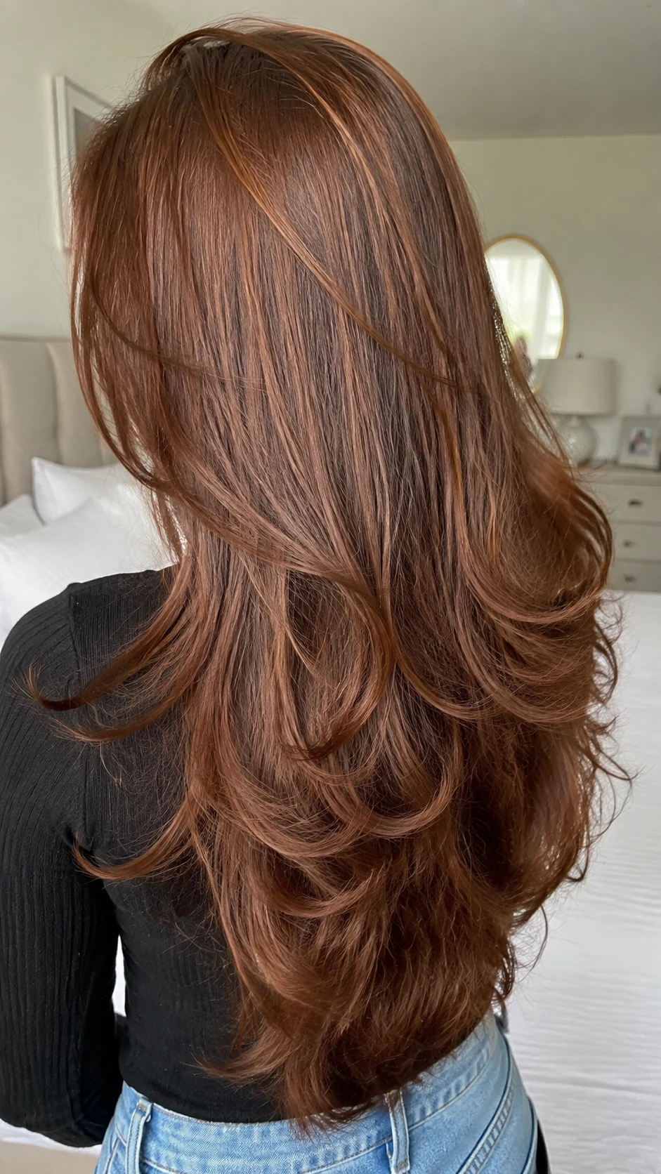 Warm chestnut brown hair with subtle red gold undertones