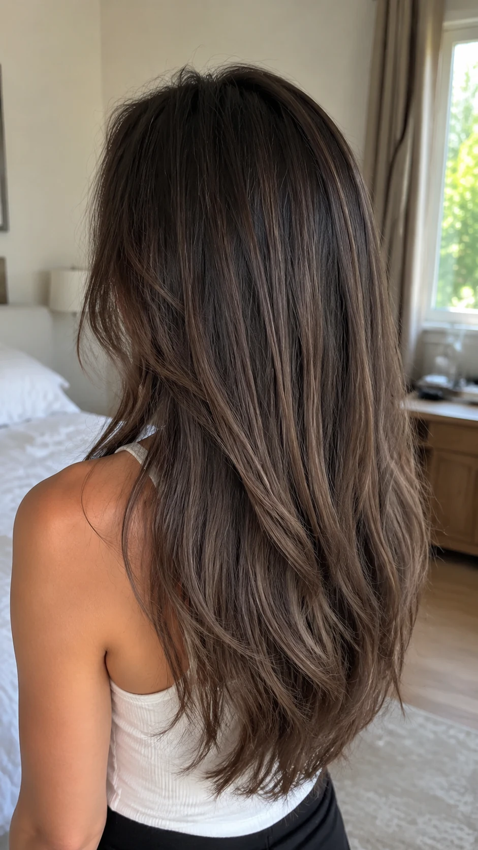 Smoky ash brown hair color with cool beige dimension