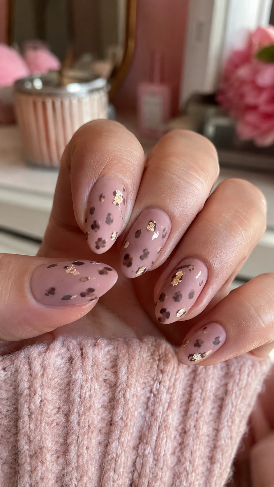 Matte dusty pink cheetah nails with delicate gold foil