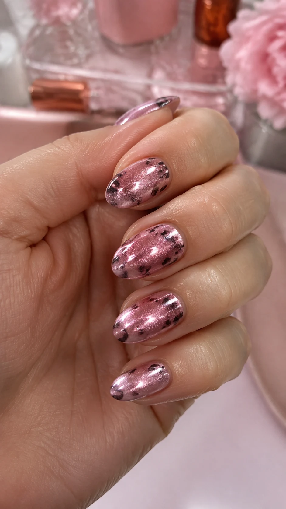 Pink velvet cat eye nails with sparse cheetah print