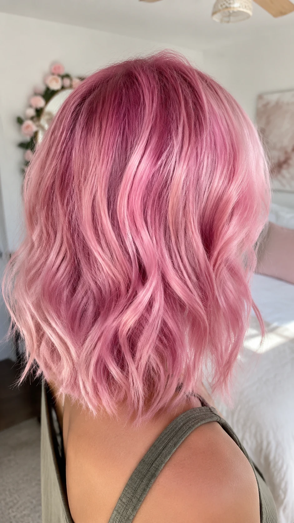 Wavy cotton candy pink lob with deeper rosy roots